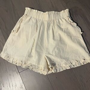 Women's Cream Ruffle Hem Shorts